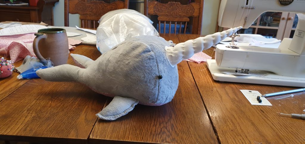 A proud picture of my very first handmade stuffed animal. This narwhal was made with much love and care. | Effective Ways to Make Extra Money... For Travel