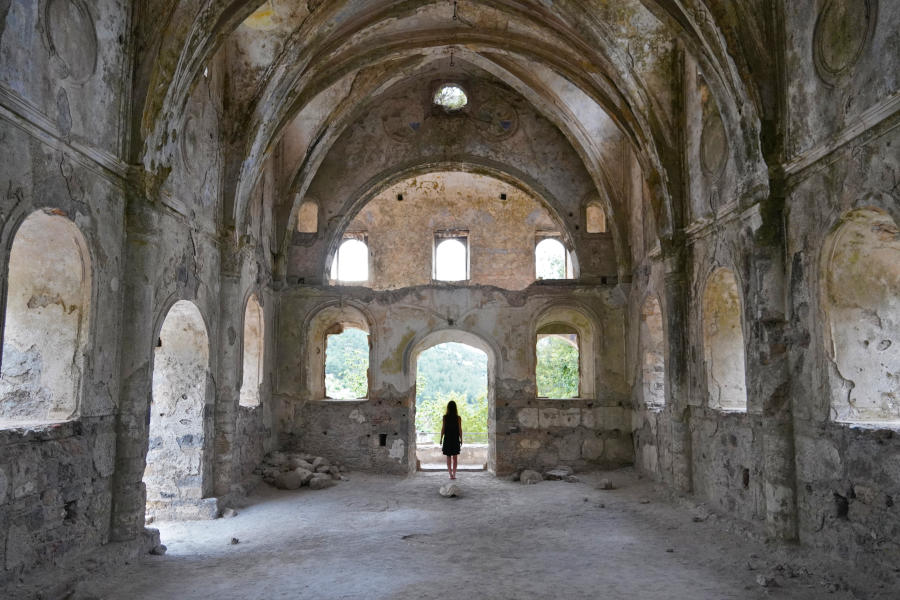 Christina Standing Alone in Turkish Ruins | Solo Travel As A Female Is More Liberating Than You Think